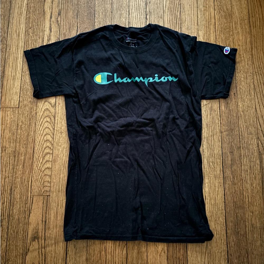 Champion black tee with green logo
